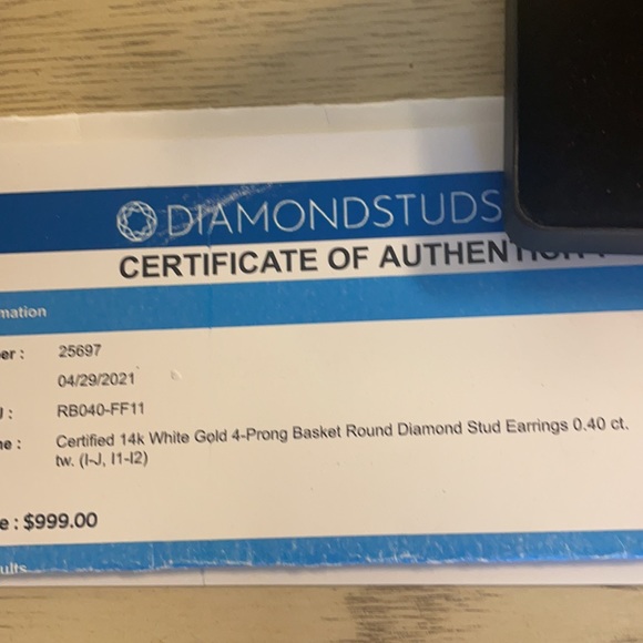 Diamond studs! I-j color in 14 k white gold. .40 cttw - Picture 2 of 4